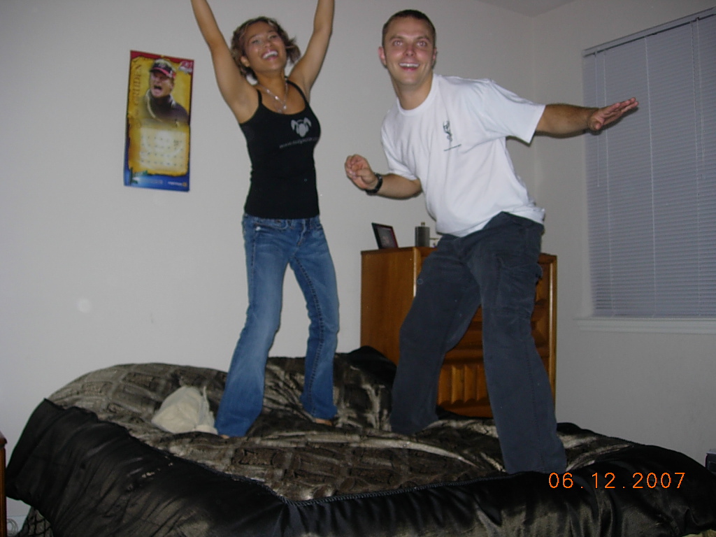 June 12, 07 - Jason's house party - suzy & jason jumping on the bed